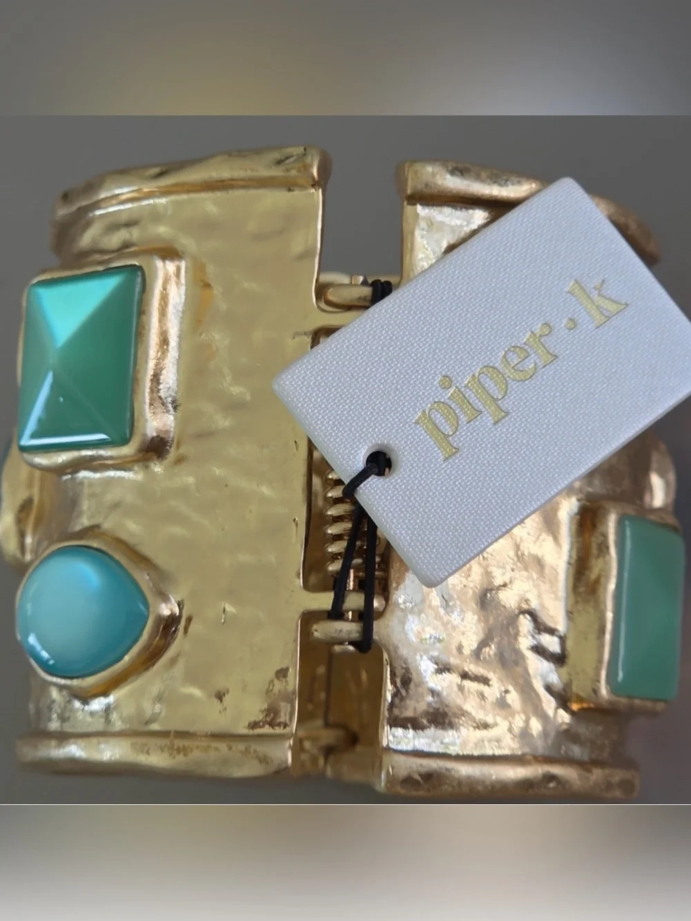 Piper K gem embellished wide gold spring cuff
NWOT - Picture 2 of 4